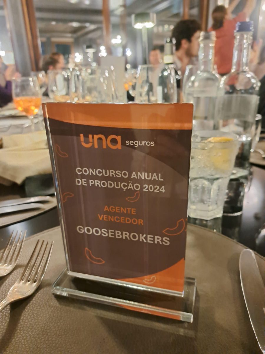 PremioUNASeguros GooseBrokers placa PremioUNASeguros GooseBrokers placa